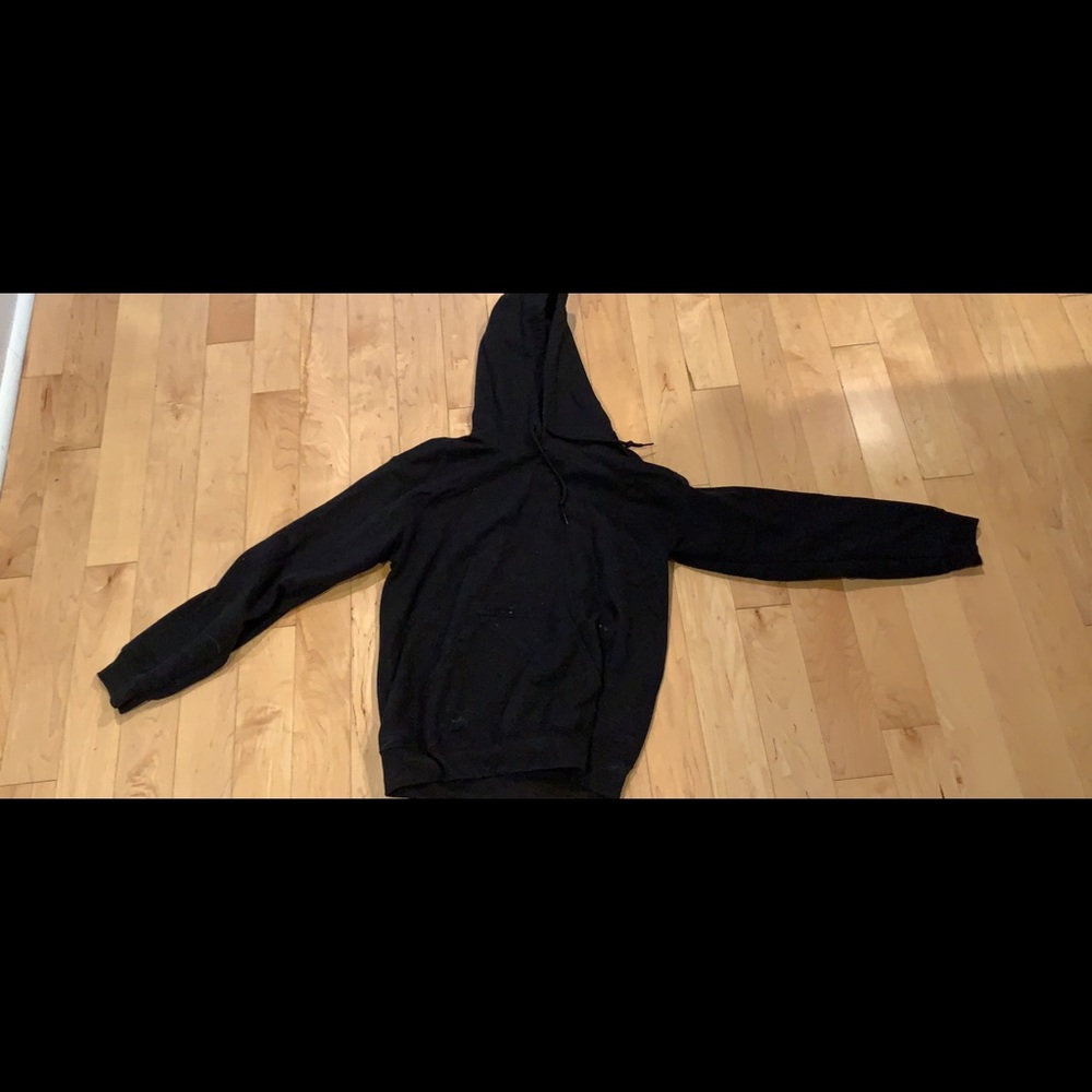 Black drawstring hoodie with front pocket